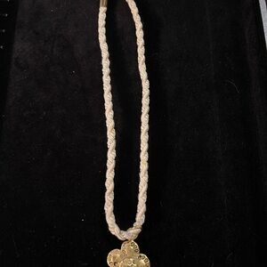 Gold Clover Pendant on Cream Braided Necklace